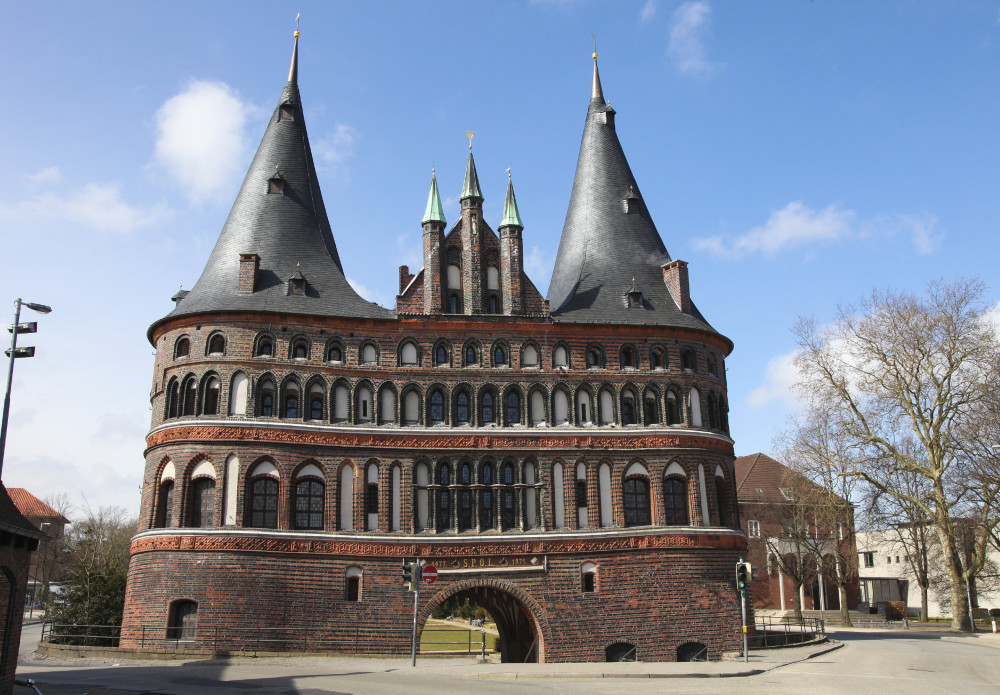 The Holsten Gate (Holstein Tor, later Holstentor) is a city gate marking off the western boundary of the old center of the Hanseatic city of Lubeck, Schleswig-Holstein, Germany.