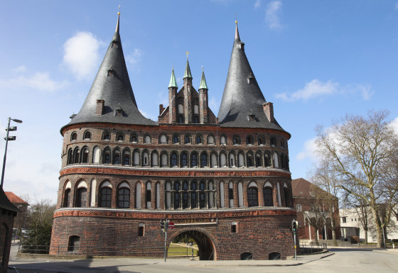 The Holsten Gate (Holstein Tor, later Holstentor) is a city gate marking off the western boundary of the old center of the Hanseatic city of Lubeck, Schleswig-Holstein, Germany.